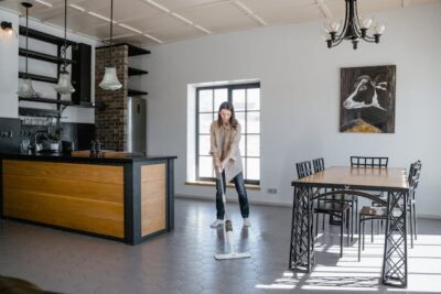 Woman Mopping the Floor